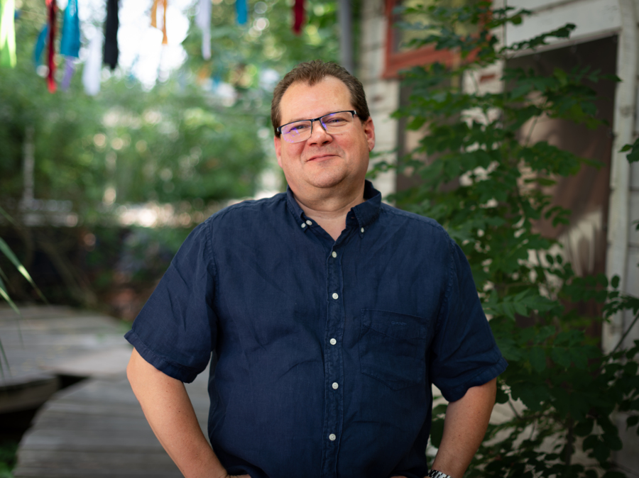 man in blue shirt